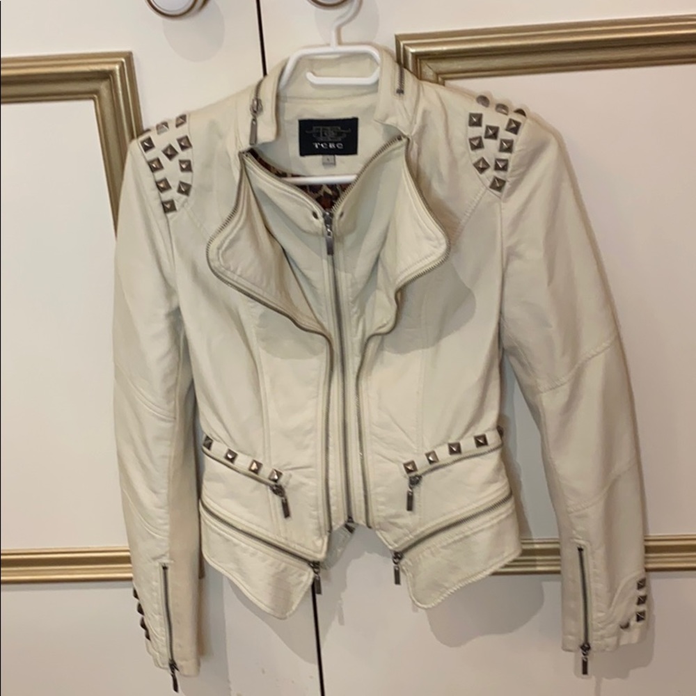 White faux leather jacket with silver studs